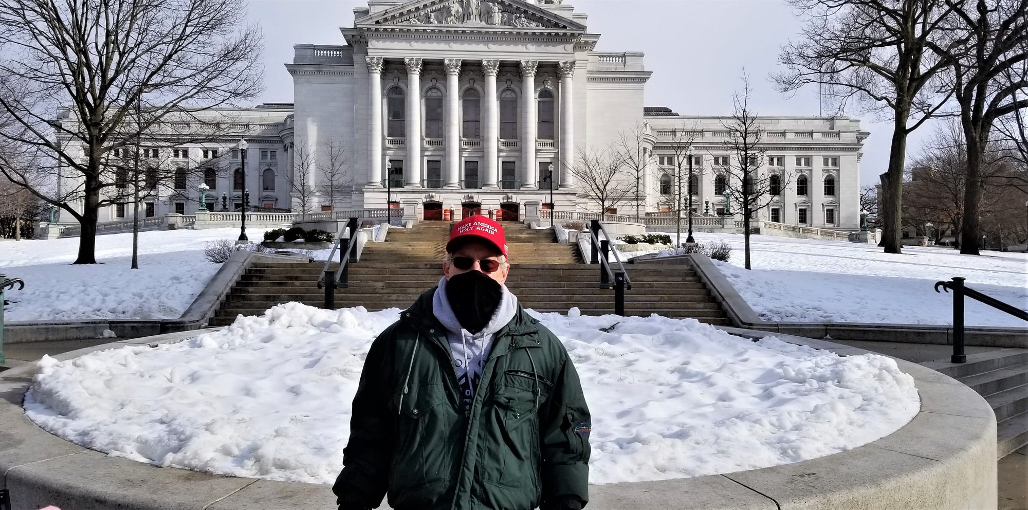 Ronald Faust, a supporter of President Trump, standing by the Capitol building in Madison, Wisconsin. Kay Nolan for Insider